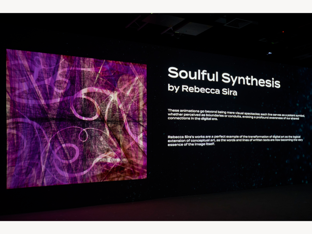 Wall projection of Soulful Synthesis by Rebecca Sira, with title and curatorial text displayed beside it, Technology and Humanity Canvas at Kanvas, Dubai